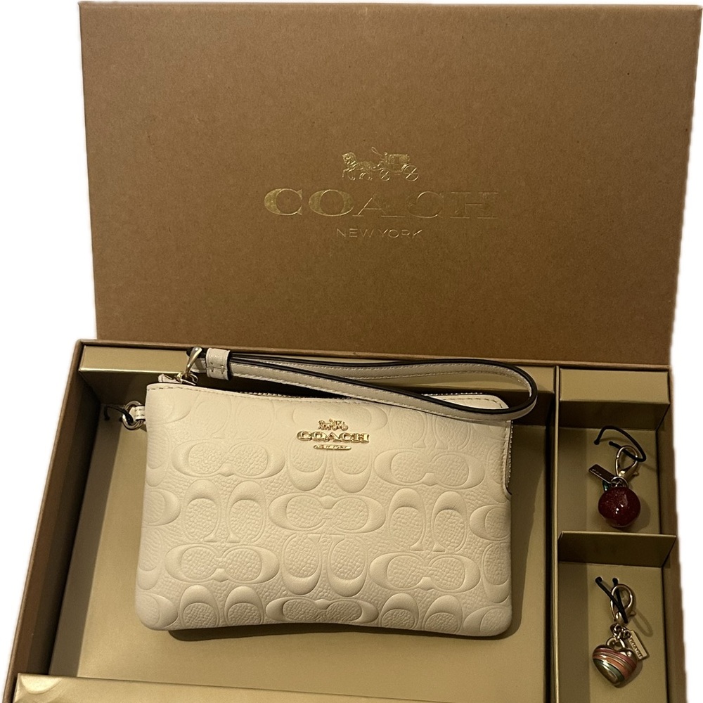 Coach Cream Wristlet with Charms in original box